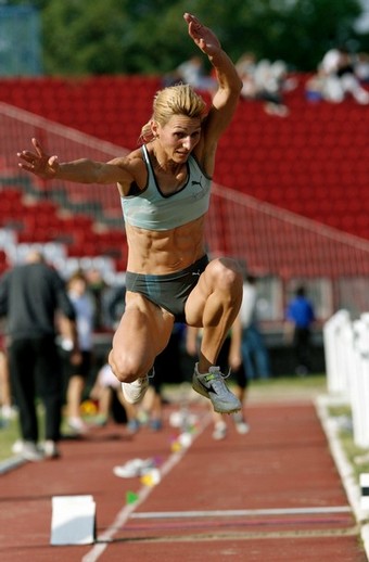Serbia's Olympic hopeful Biljana Topic competes in triple jump event during track and field competition in Kragujevac